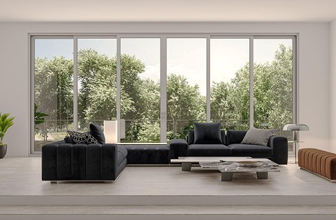 Modern living room with large windows illustrating ideal customers for Dr. Makaan window & door repair services