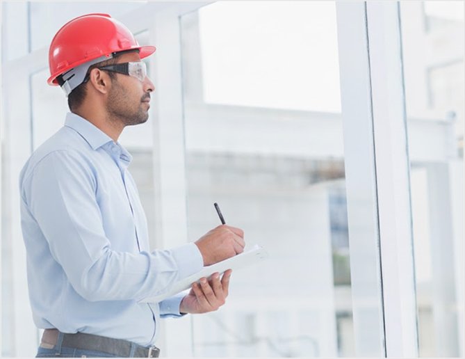 Section titled "What You Get" showing technician with hard hat taking notes and listing AMC benefits like scheduled visits, priority response, and cost comparison